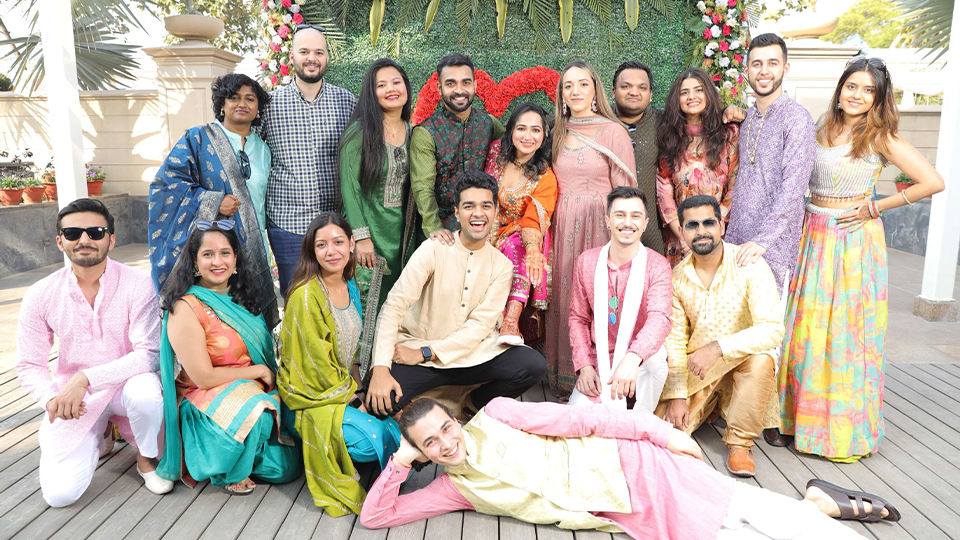 A group image of Naami and Suvam with their friends on their wedding day